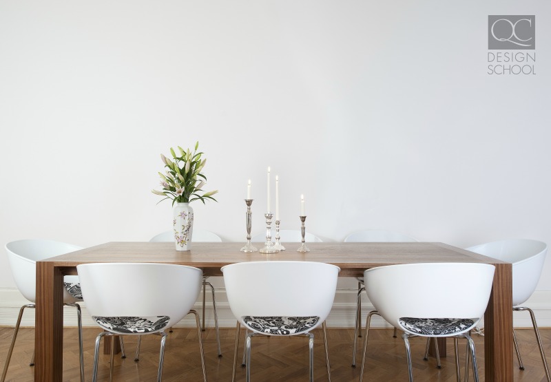 professionally staged table with white chairs