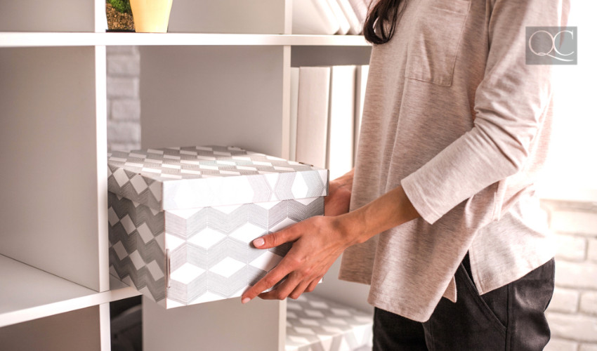 putting box into a shelving unit organizer