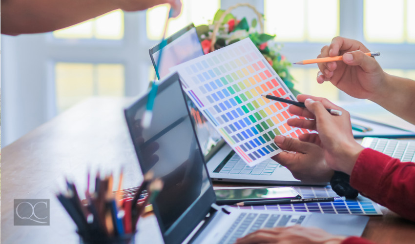 color consultant choosing paint coatings in her office