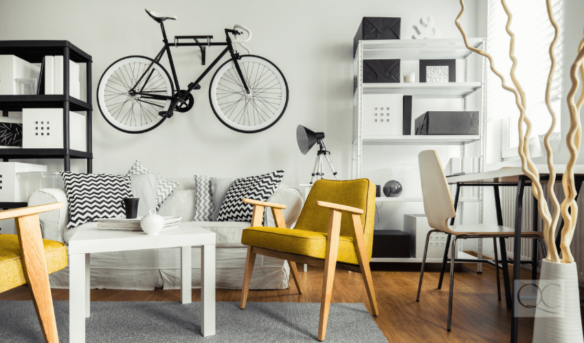 Interior of contemporary living room for hipster with bike mounted on wall