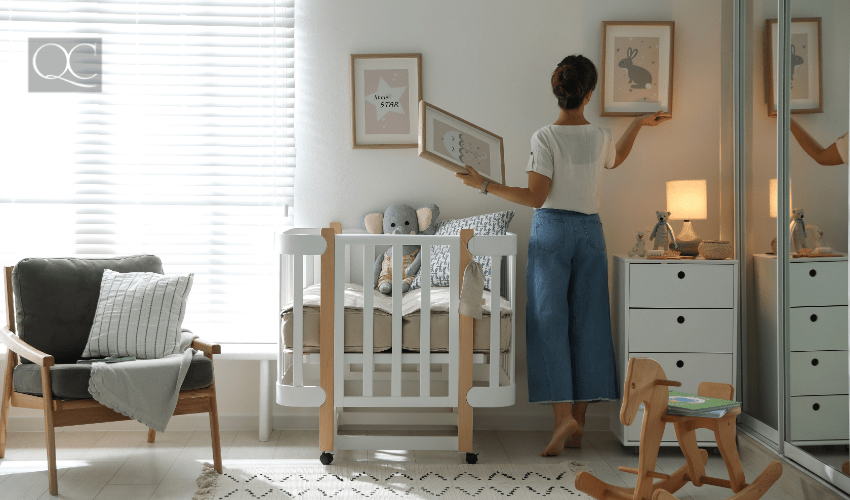 woman decorating baby nursery