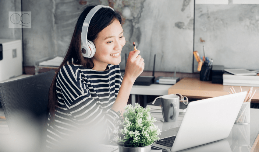 happy woman on laptop