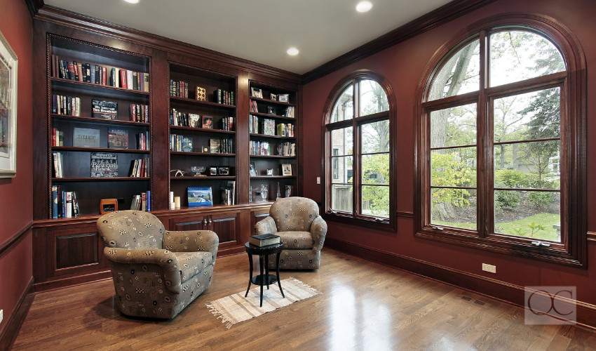 wood home library organized by a certified professional organizer