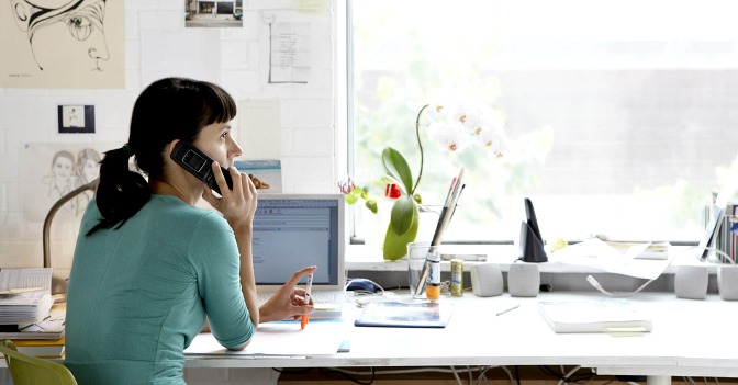 Woman conducting a long-distance consultation from home