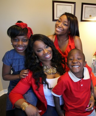 Jacqueline Forde with her children Ashantee, Rayne & Roger II