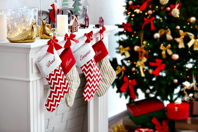 Decorating stockings to hang on the mantel for christmas decor