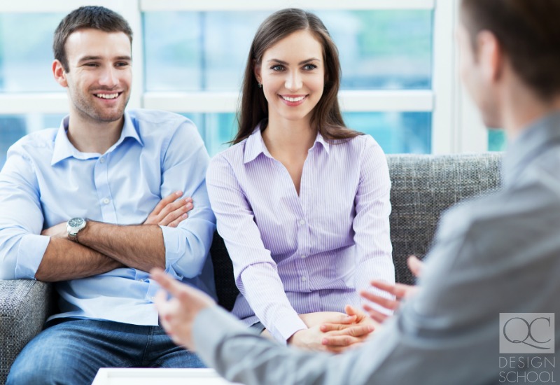 couple discuss home design ideas with interior decorator