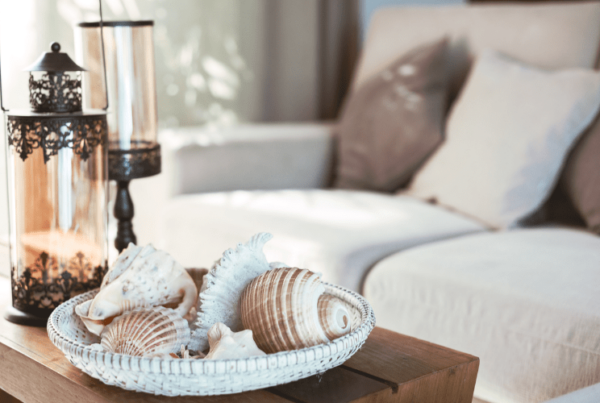 coffee table decor bowl of seashells and lamps