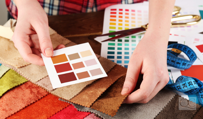 color consultant goes over color swatches for a decorating job