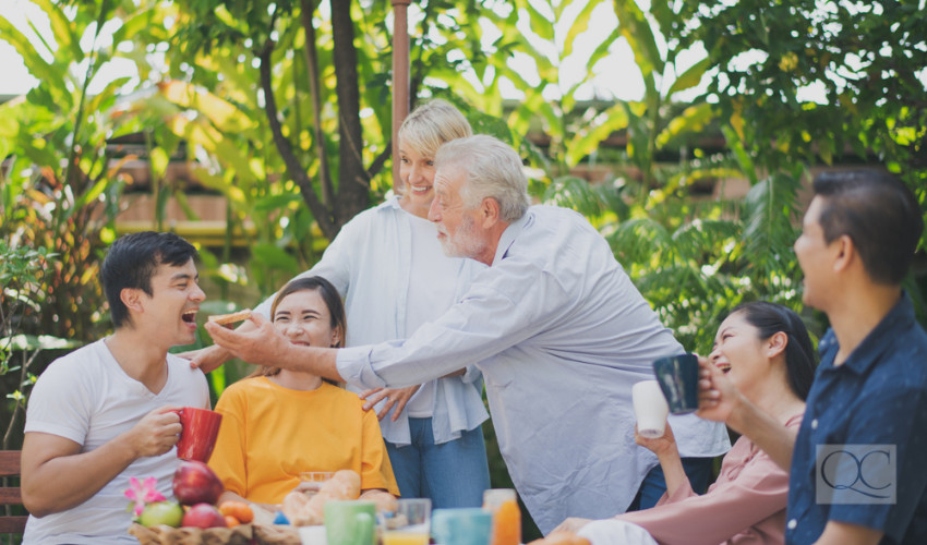 old family members at family party backyard