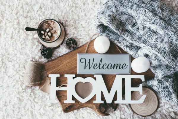 welcome home decor with blanket and head chocolate