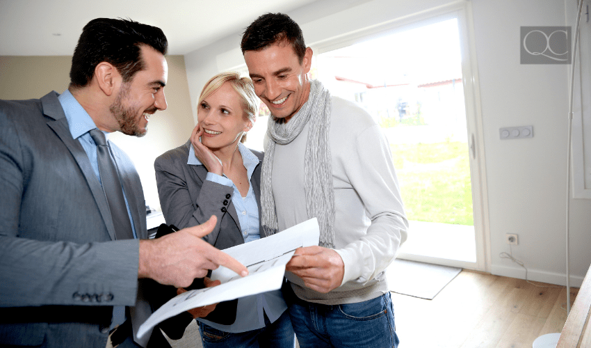 prospective buyers seeing home with real estate agent