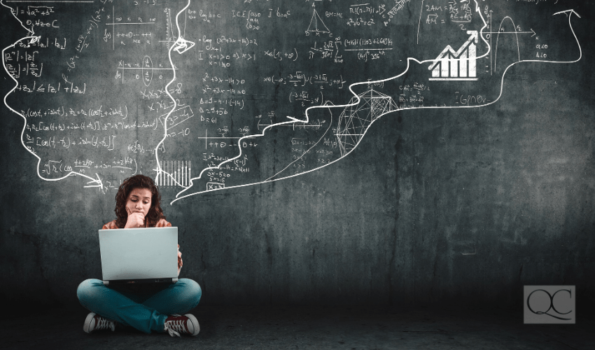 confused girl on laptop, with math equations in the background