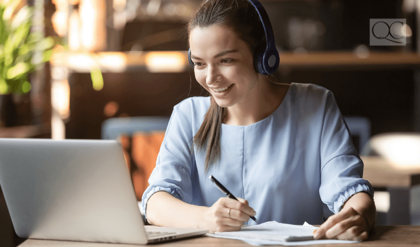 international student learning on laptop at home