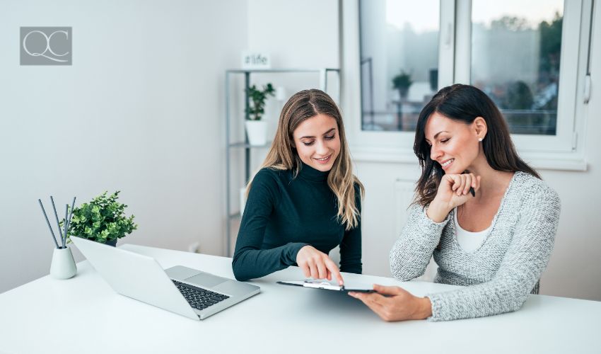 Design career spotlight article, June 15 2021, last in-post image. Two casual business women at work.