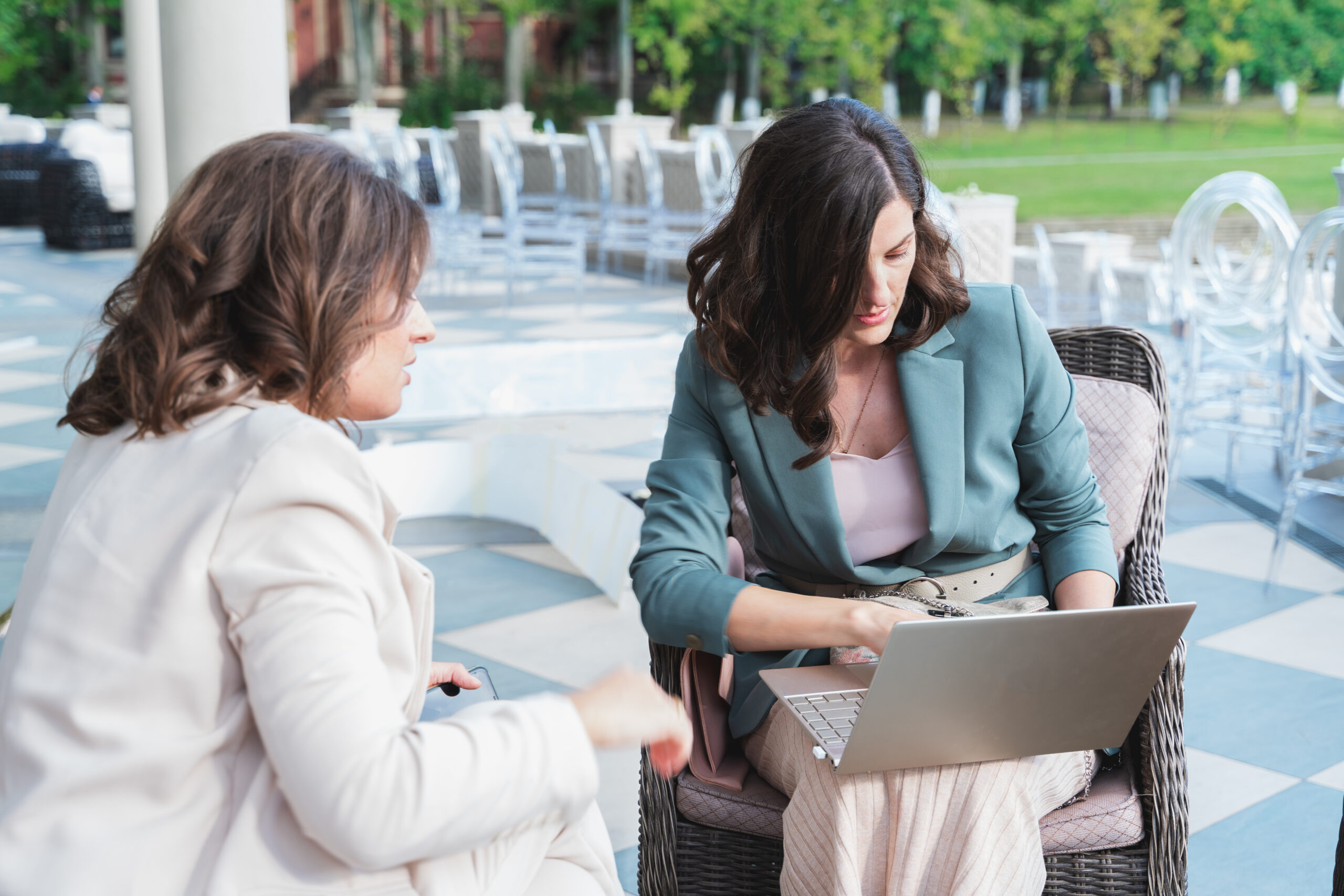 Two women looking at laptop